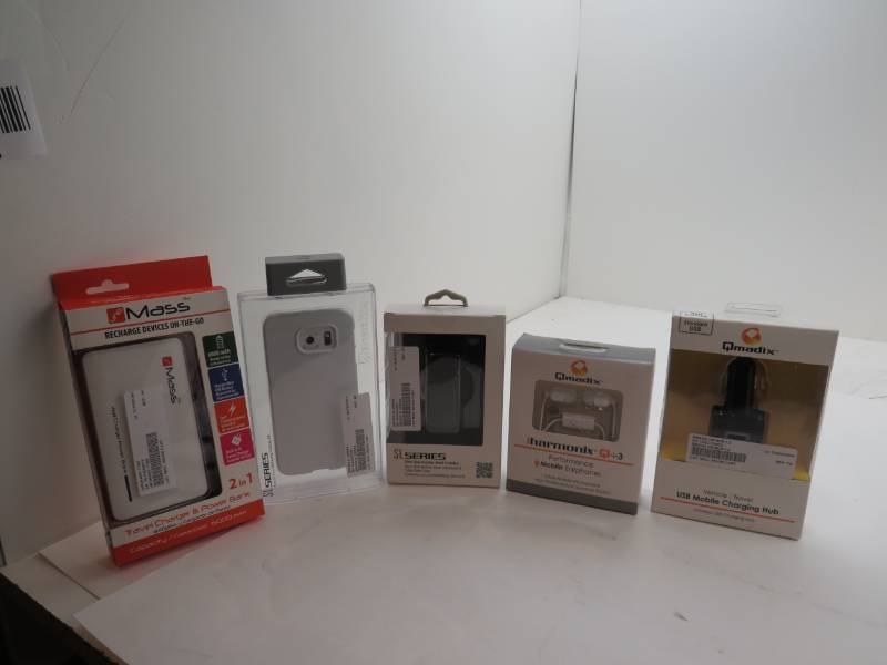 lot 5 image: Cell phone kit with Protector car charger, head phones and more.