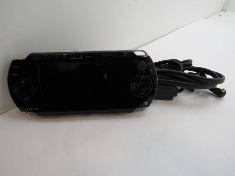 lot 12 image: SONY PSP GAME SYSTEM