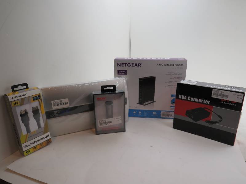 lot 18 image: Lot of misc electronics gear with a Net Gear wireless router and so much more
