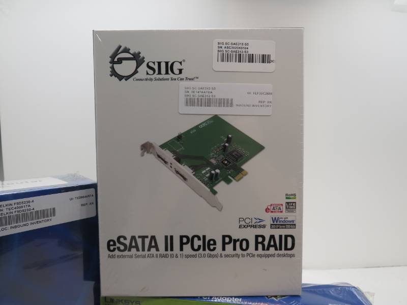 lot 34 image: Network lot with  a switch router and wireless card