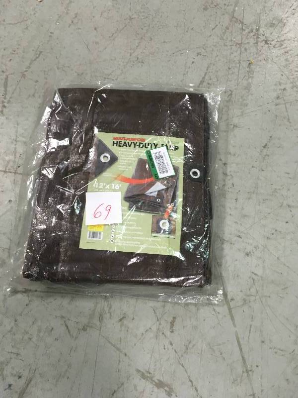 lot 69 image: 12 ft. x 16 ft. Heavy-Duty Tarp not used