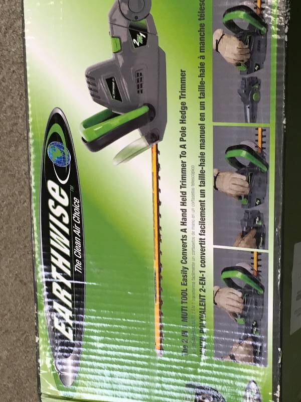lot 18 image: Earthwise 2 in 1 18 in. 4.5 Amp Electric Multi-Tool PoleHedge Trimmer not used in good condition