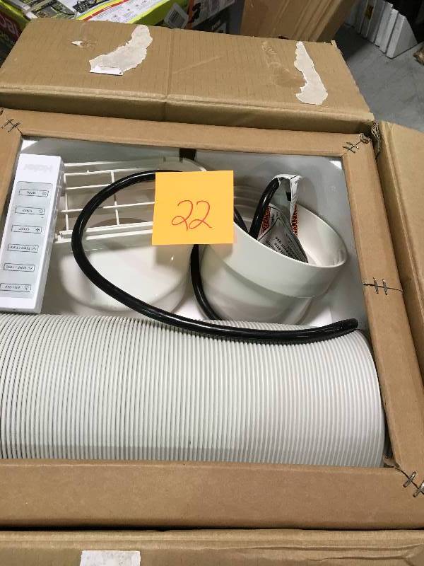 lot 22 image: HAIER 10,000 BTU Portable Air Conditioner with Dehumidifier in like new condition
