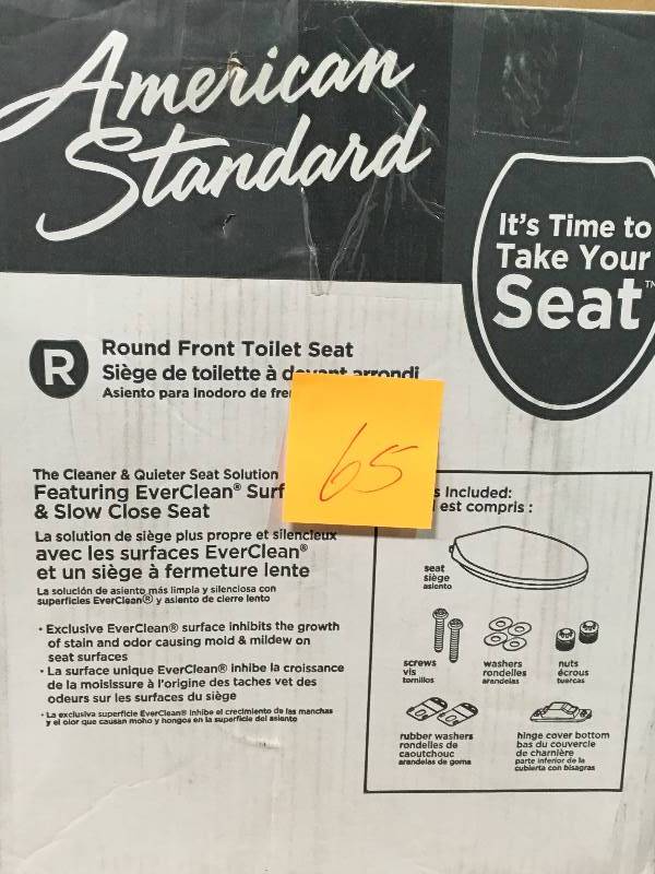 lot 65 image: American Standard Cadet Round Front Slow Close Toilet Seat not used in good condition