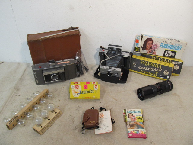 lot 44 image: Vintage Polaroid Land Cameras Zoom Lens & Accessories