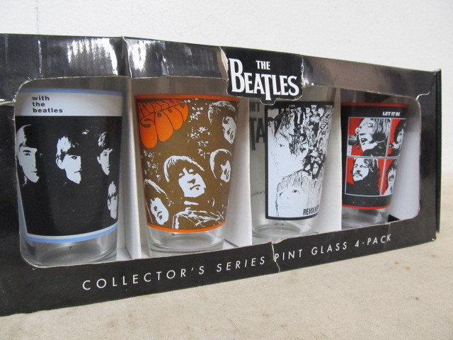 lot 146 image: New BEATLES Set of 4 Pint Glasses
