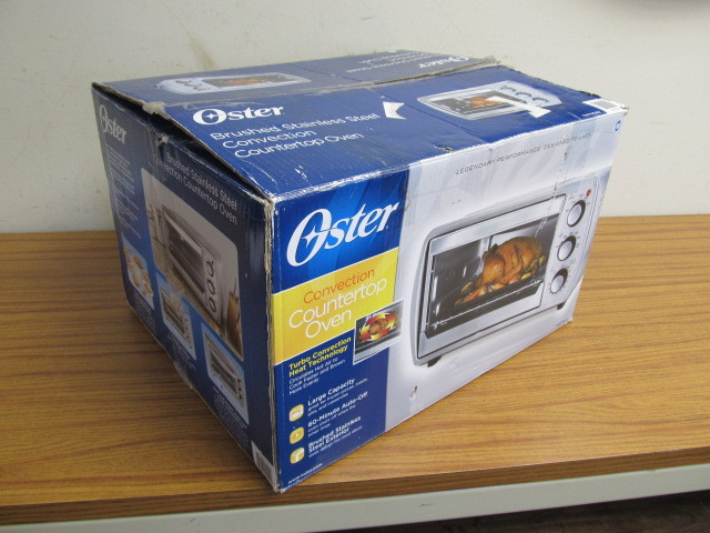 lot 185 image: New OSTER Convection Countertop Oven
