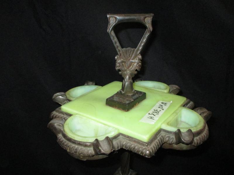 Very Unique Antique Ashtray Metal and looks like marble Vaseline glass