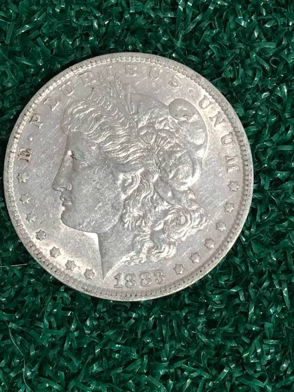 lot 61 image: 1883 Morgan Silver Dollar