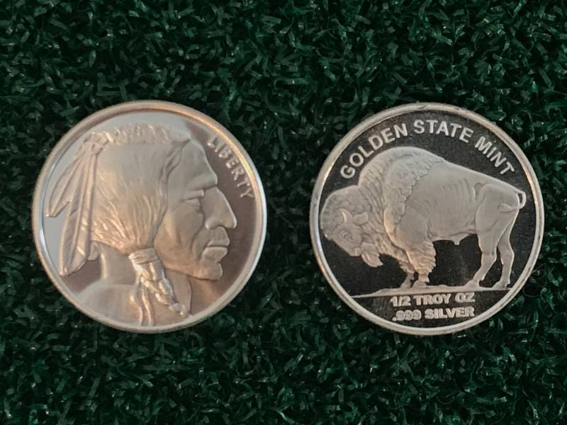 lot 77 image: Lot of 2 Sioux Bison .999 12 oz Silver Coins