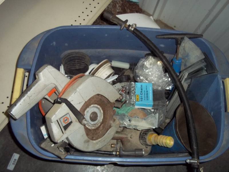 lot 110 image: Large Lot with Saw, Plumbing parts, and assorted items