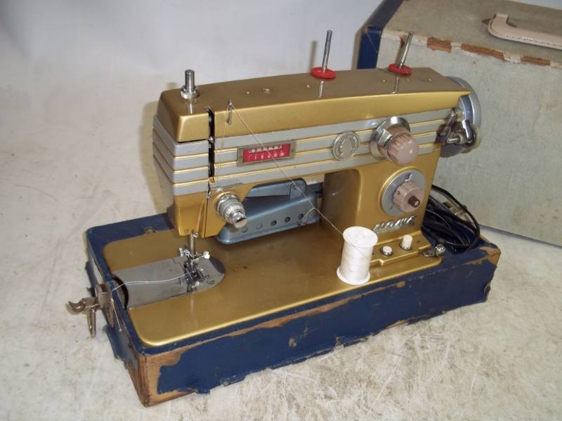 lot 58 image: Vary Rare Elias Howe Jr sewing Machine in Gold 