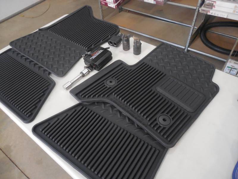 lot 44 image: AUTOMOTIVE ACCESSORY LOT - NEW FLOOR MATS - HITCH LOCK - LIGHT ADAPTERS