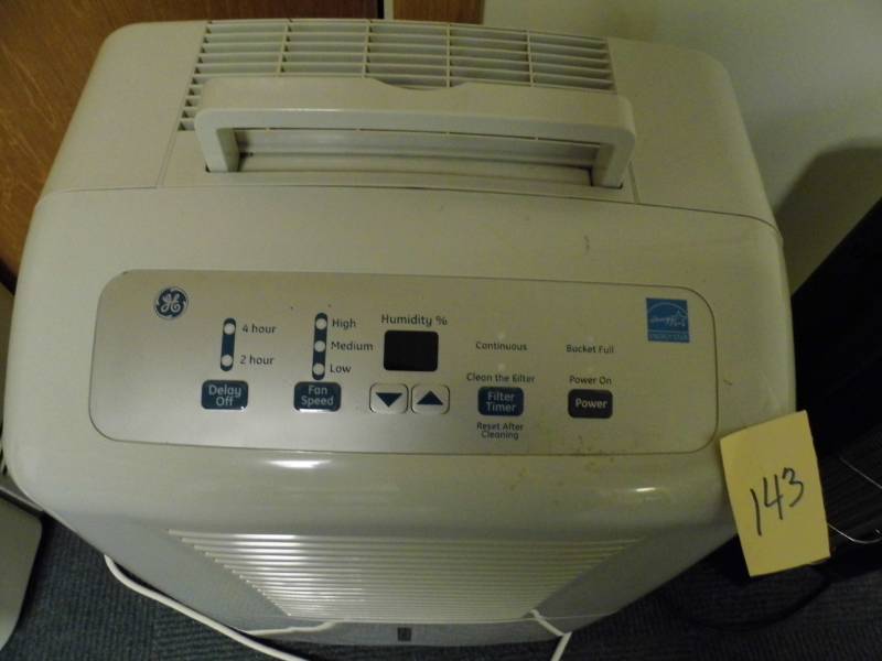 lot 143 image: GE Dehumidifier