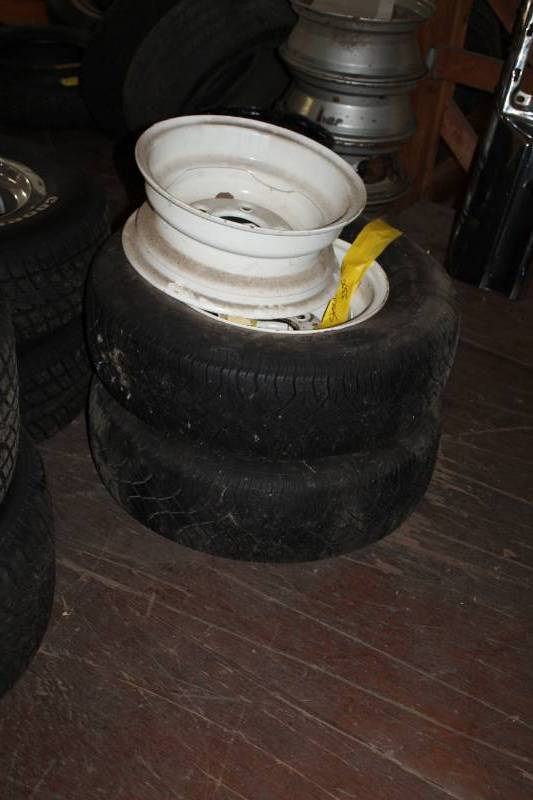 lot 24 image: Lot of (2) P22575R15 Tires w 3) 5-Lug Wheels