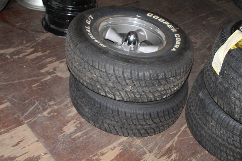 lot 28 image: Lot of (2) Cooper Cobra Radial GT P22570R15 White Letter Tires w American Racing 15in. 5-Lug Wheels