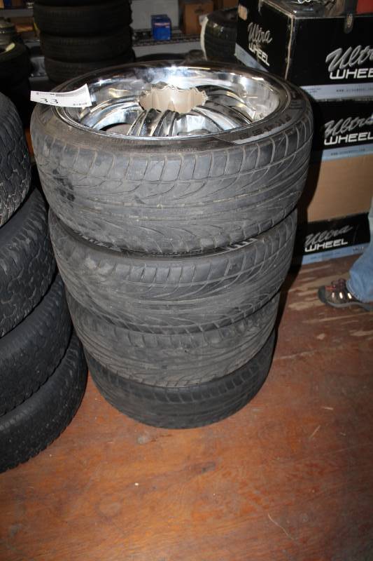 lot 33 image: Lot of (4) Falken FK452 P25535ZR20 Tires w Custom 20in. Wheels