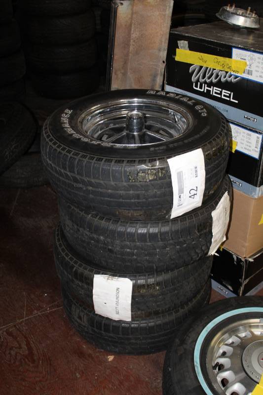 lot 42 image: Lot of (4) Performance Radial P21570R14 White Letter Tires w 14in. 5-Lug Wheels