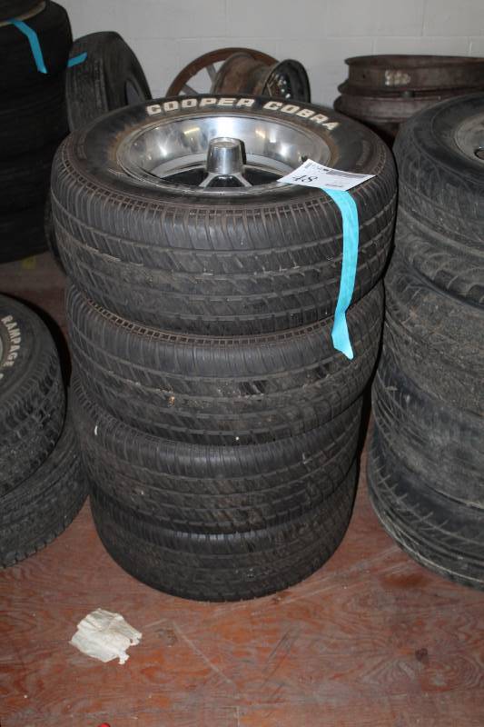 lot 48 image: Lot of (4) Cooper Cobra Radial GT P24560R14 White Letter Tires w 14in. 5-Lug Wheels