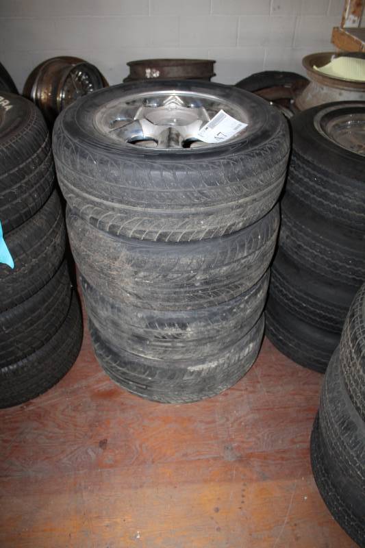 lot 47 image: Lot of (4) Falken Ziex ZE512 P23560R16 Tires w 16in. 5-Lug Wheels