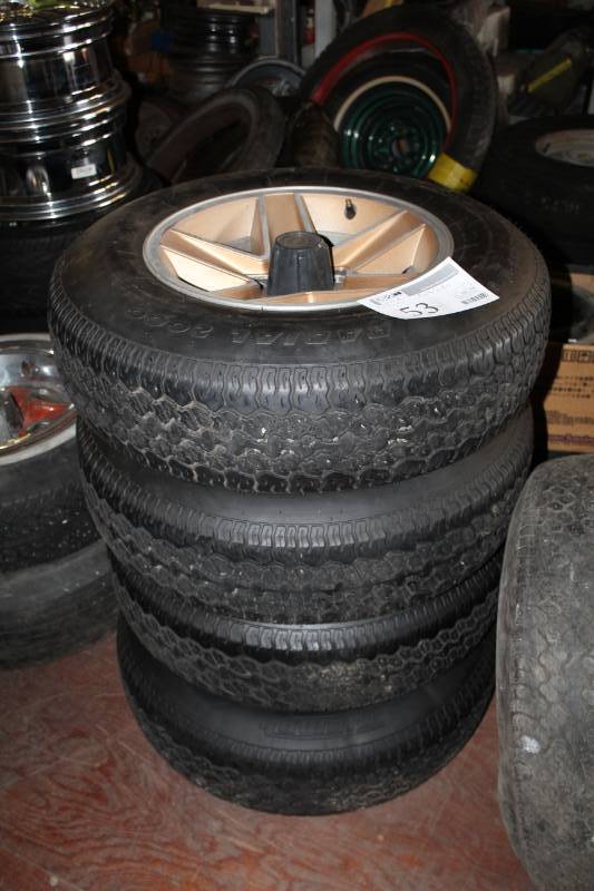 lot 53 image: Lot of (4) Triumph Radial 2000 P20575R15 Tires w 15in. 5-Lug SE Wheels