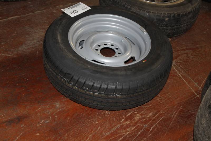lot 80 image: Milestar Touring P20570R15 Tire w 15in. 10-Lug Wheel