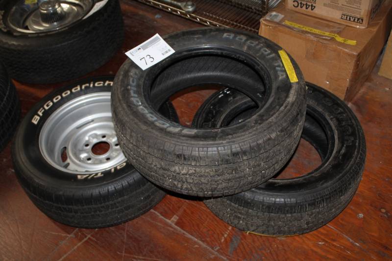 lot 73 image: Lot of (3) BF Goodrich Radial TA P21560R14 White Letter Tires w 1) 14in. 5-Lug Steel Wheels