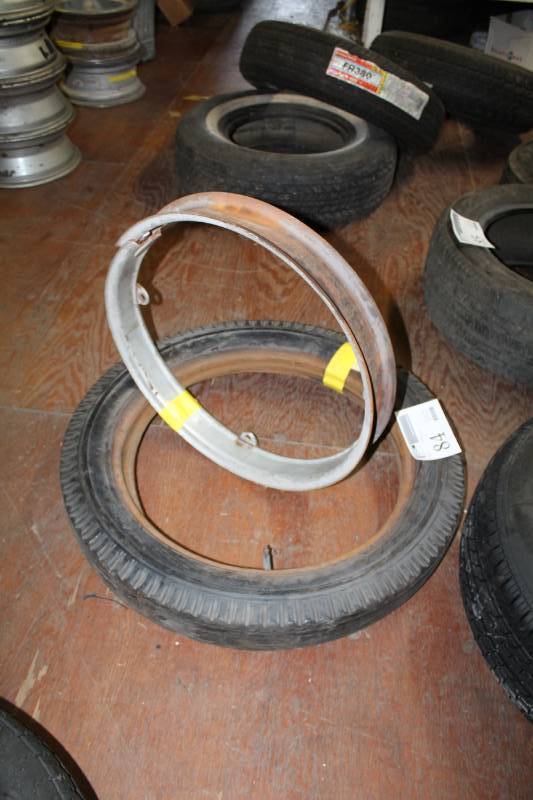 lot 84 image: 4.404.50-21 Tire w Rim