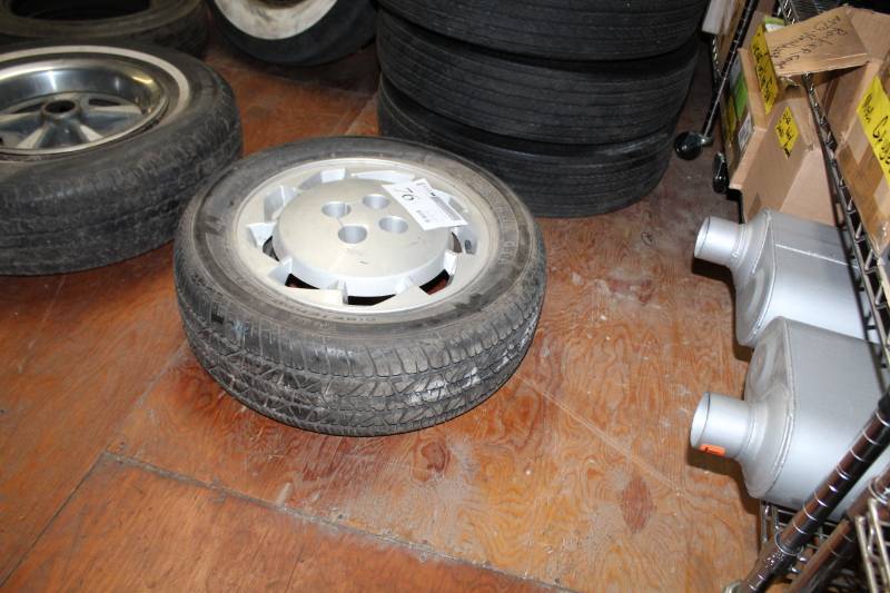 lot 76 image: Firehawk GTA P19560R15 Tire w 15in. 4-Lug Wheel