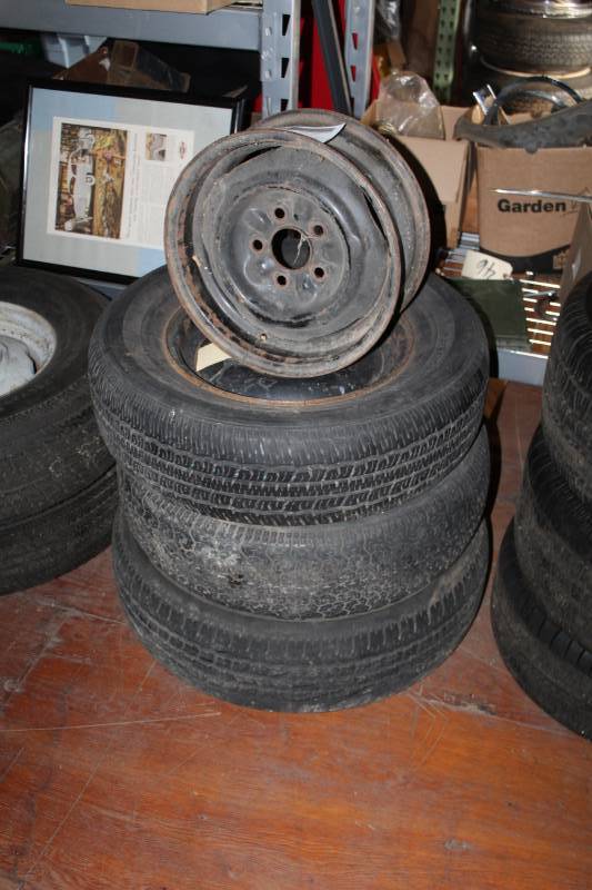 lot 66 image: Lot of (3) Firestone FR680 P21570R15 Tires w 4) 15in. 5-Lug Steel Wheels