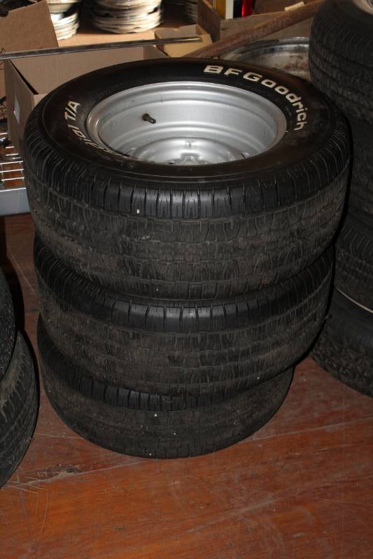 lot 65 image: Lot of (3) BF Goodrich Radial TA P24560R14 White Letter Tires w 14in. 5-Lug Steel Wheels