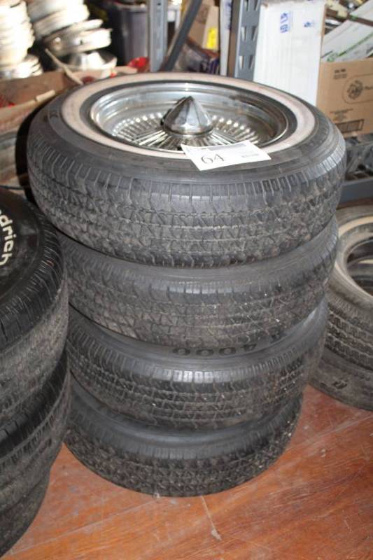 lot 64 image: Lot of (4) National XT 4000 P20575R15 Whitewall Tires w 15in. 5-Lug Wheels