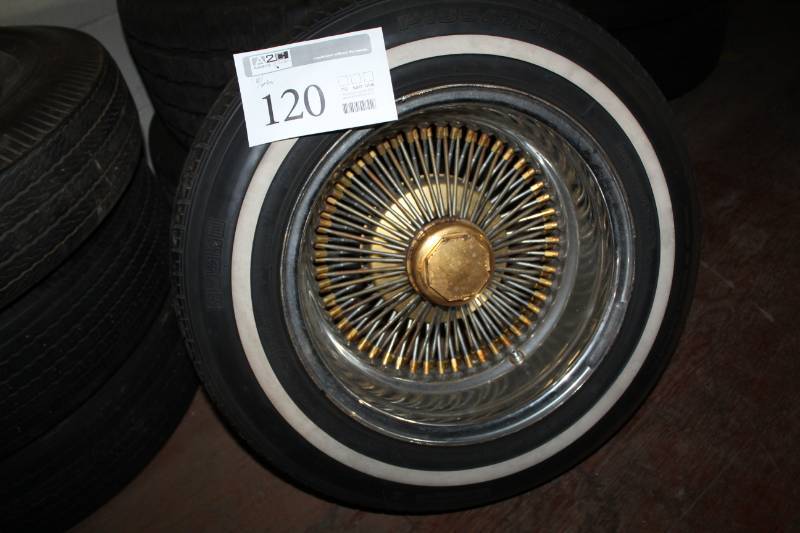 lot 120 image: P18575R14 Whitewall Tire w 14in. 5-Lug Wire Wheel