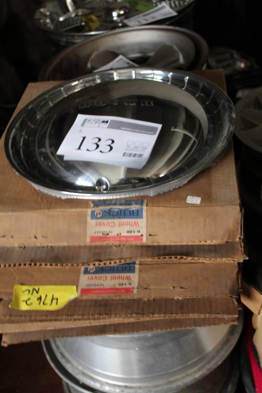 lot 133 image: Lot of (4) Buick Hubcaps