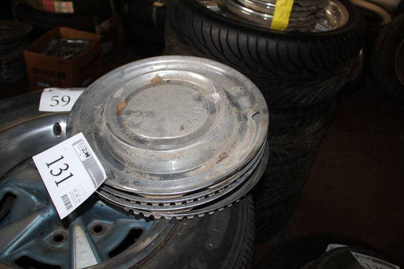 lot 131 image: Lot of (4) Pontiac Hubcaps