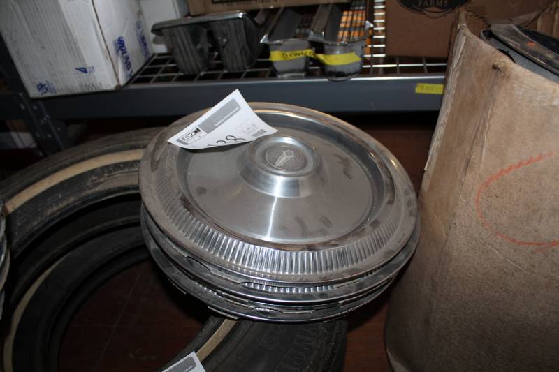lot 138 image: Lot of (4) Pontiac Hubcaps