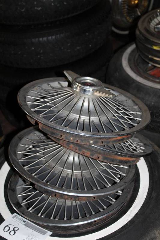 lot 126 image: Lot of (4) Pontiac Hubcaps