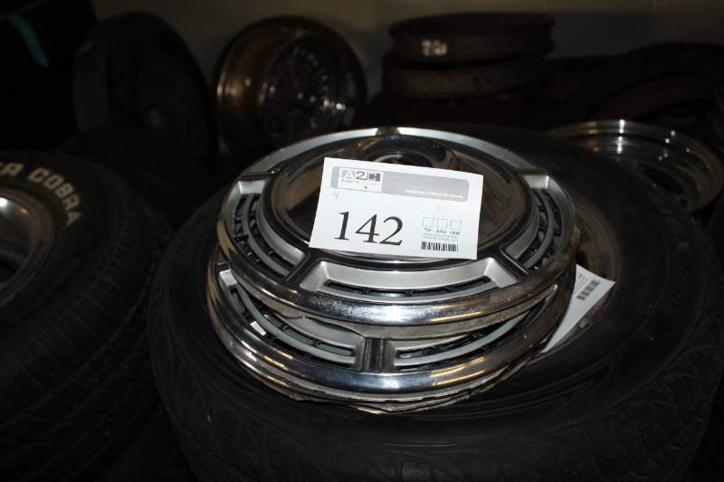 lot 142 image: Lot of (4) Chevrolet Hubcaps