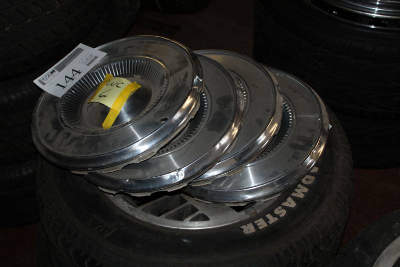 lot 144 image: Lot of (4) GM Hubcaps