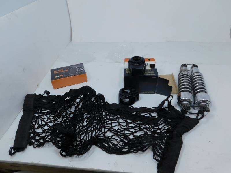 lot 20 image: Lot Of Two Motorcycle Items-Black Cargo Net & A Coosh Car Vent Phone Mount