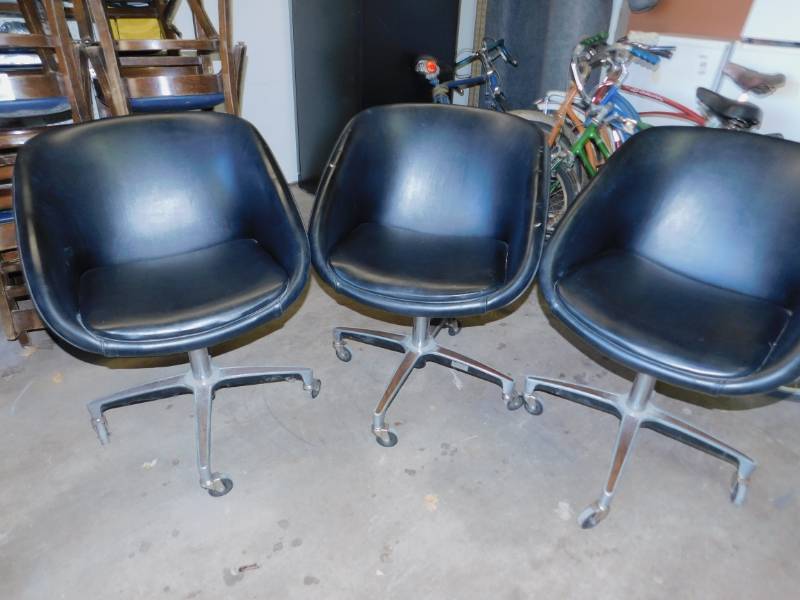 lot 33 image: Three Black Padded Chairs On Casters