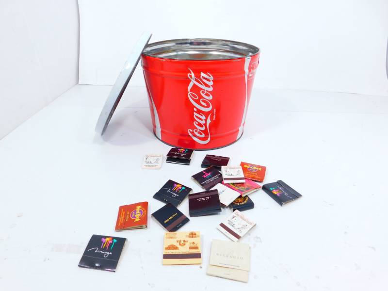 lot 67 image: Coca Cola Tin With Various Matchbooks Inside