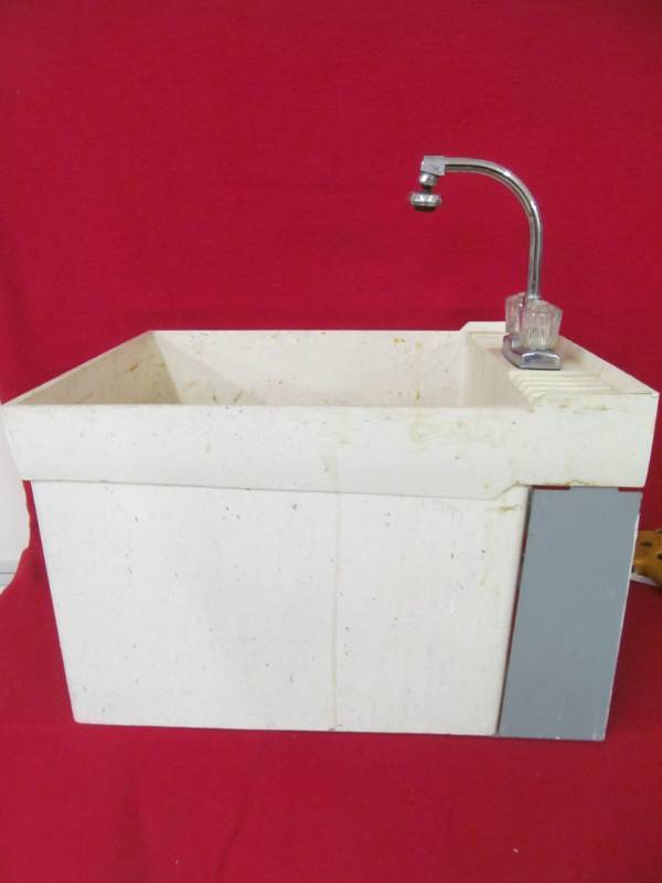 lot 11 image: Laundry sink, Utita tub with faucet