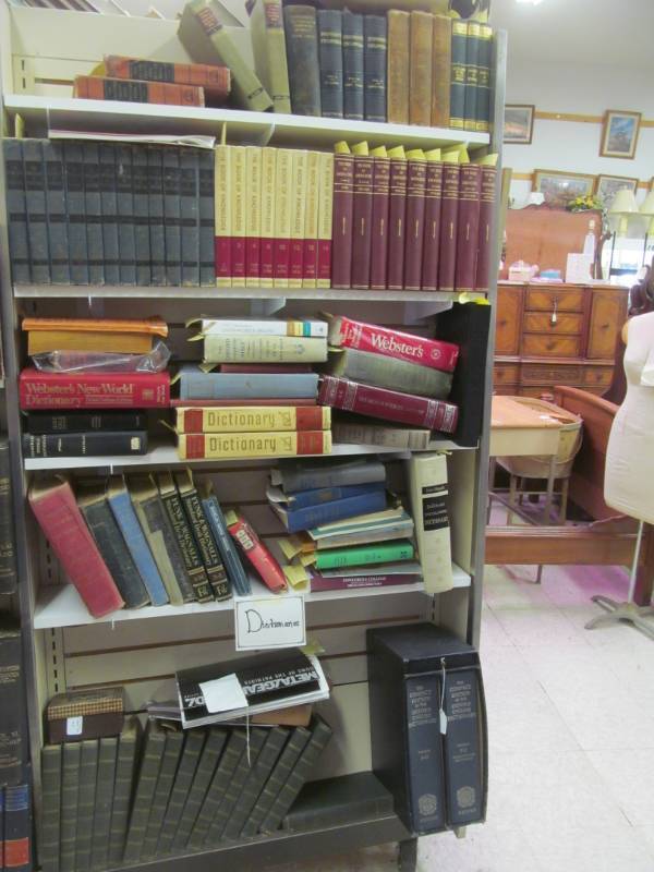 lot 39 image: books, large selection of dictionaries, (Book of Knowledge, Everybodys Encyclopedia, Funk & Wagnalls Standard Desk Dictionary) (Shelf not included)