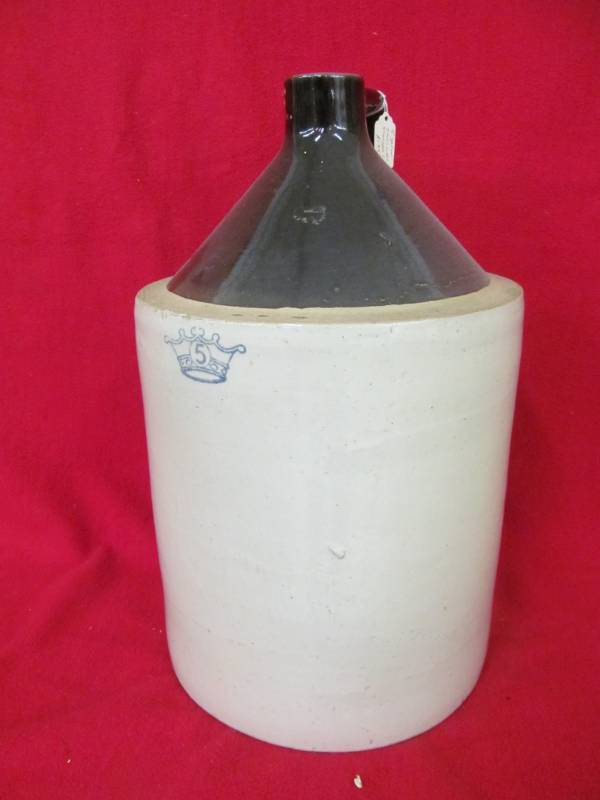 lot 70 image: 5 gallon stoneware shoulder jug, Blue crown on the front