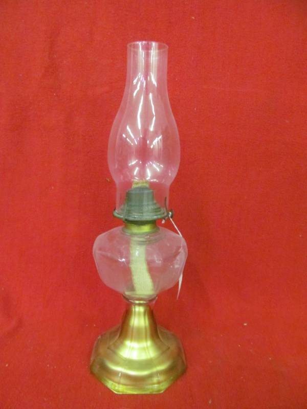 lot 74 image: Kerosene lantern with sprayed gold base