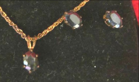 lot 86 image: Genuine Sapphire necklace and earring set (jeweler appraised value $49.95)