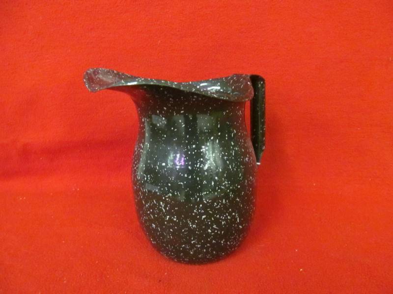 lot 106 image: US Navy enamel pitcher