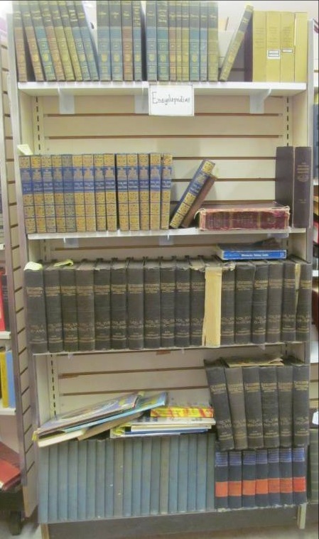 lot 144 image: Shelves full of Encyclopedias, Standard American, shelf not included