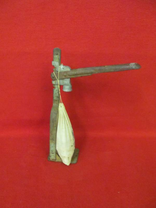 lot 180 image: Cap topper, Hines, Charles Hines Company